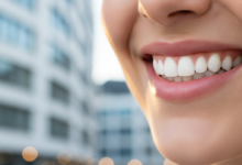 A close-up, photorealistic image of a radiant, confident smile with perfectly whitened teeth. The background is softly blurred, showing abstract hints of modern dental aesthetics and a faint suggestion of European city architecture, representing Belgium.