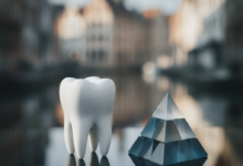 A close-up, photorealistic image of a clean dental model representing a molar tooth, placed next to abstract, non-textual geometric tokens symbolizing cost or value. The background is a deeply blurred, atmospheric view of historic Ghent architecture and canals, under soft, diffused light.