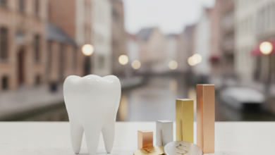 A stylized white tooth model on a clean surface, next to abstract, non-identifiable shapes suggesting varying financial costs. The background is a very blurred image of Ghent's historic cityscape, with hints of medieval buildings and canals. The lighting is soft and cinematic, with a shallow depth of field.